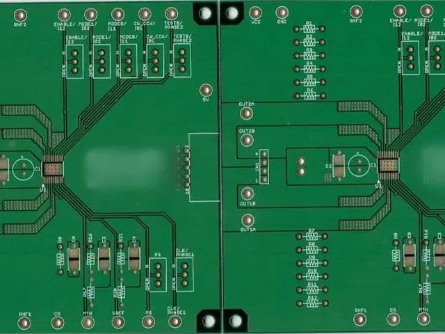 Double-sided green PCB panel with routed outlines